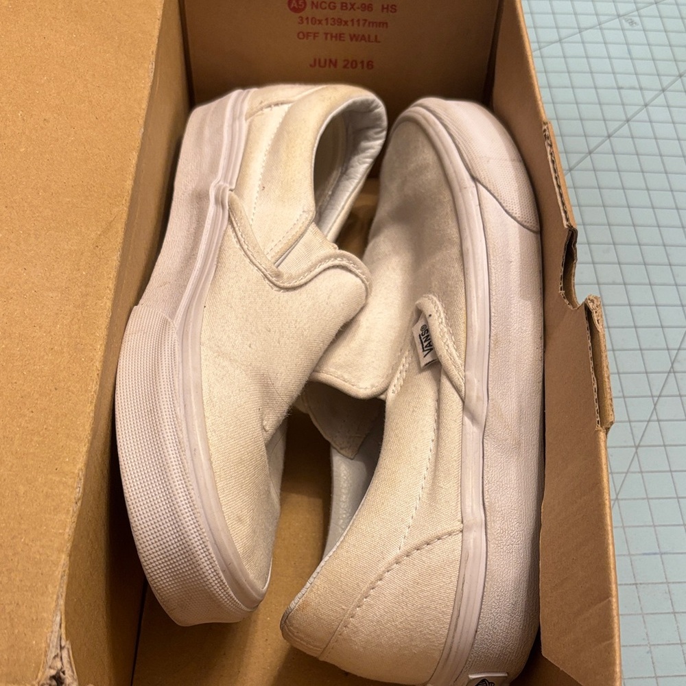 Vans Off-White Canvas Slip-Ons